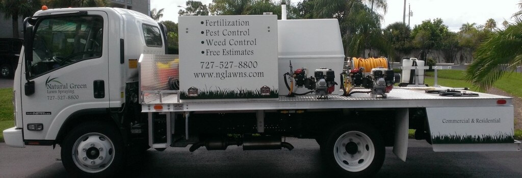 lawn spraying work truck with equipment